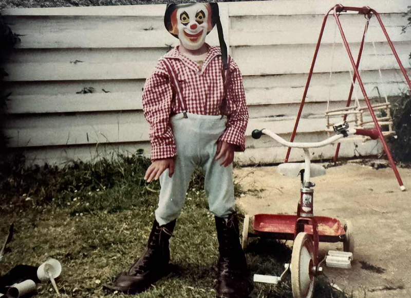 Clumsy aged three in clown costume after visiting his first circus